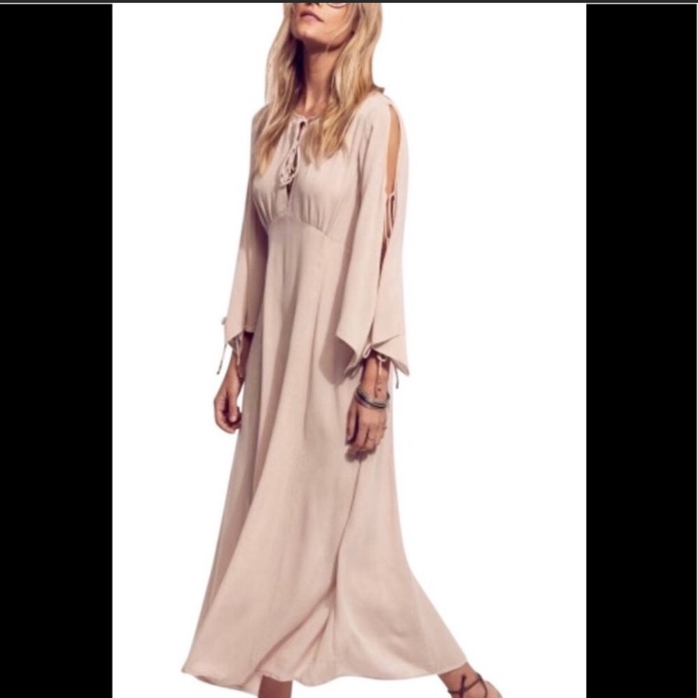 Free people dress with beaded embellishments.